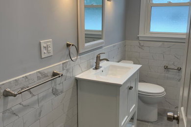 Inspiration for a small contemporary 3/4 white tile and porcelain tile porcelain tile and gray floor bathroom remodel in Philadelphia with open cabinets, white cabinets, marble countertops, white countertops, a one-piece toilet, gray walls and an integrated sink
