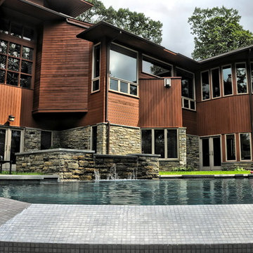 cliffside vanishing edge pool with raised spa + surge current