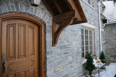 Inspiration for a country exterior home remodel in Calgary
