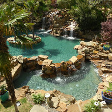natural backyard with inground spa/spool and fire pit