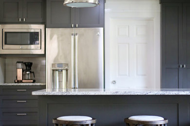Kitchen - transitional kitchen idea in Other