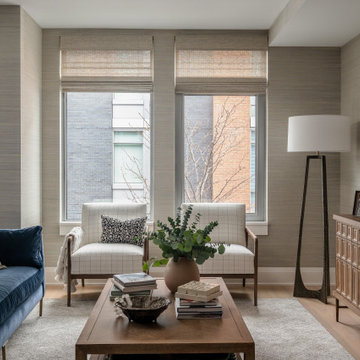 Warm Textural Living Room With Navy Sofa Neutral Grasscloth Wallpaper Woven Shad