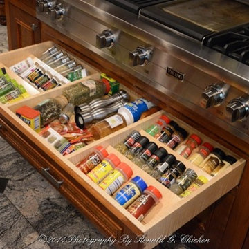 Custom Spice Drawer, conveniently placed by the stove-top.