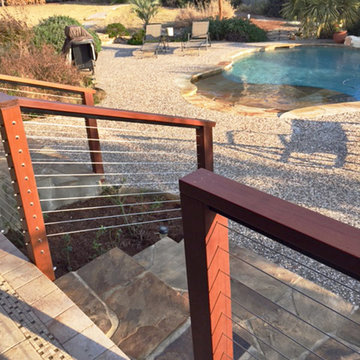 Spring Branch, TX: Ipe Railing Lining Stairs to Pool Area