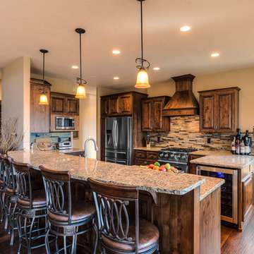 Kitchen with extended bar to accommodate dining and entertaining