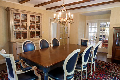 Mid-sized transitional dark wood floor and brown floor enclosed dining room photo in Toronto with beige walls and no fireplace