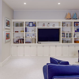 Inspiration for a large beach style look-out basement in Boston with white walls, carpet, no fireplace and white floors.