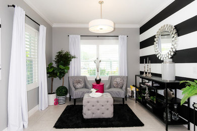 Living room - mid-sized contemporary enclosed porcelain tile and beige floor living room idea in Tampa with gray walls, no fireplace and no tv