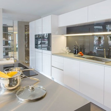 SieMatic PURE Design - White kitchen  with stainless steel countertop