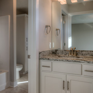 Custom Newport w/ side-load garage and master w/ sitting room