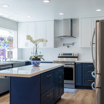Modern Navy Blue Kitchen with White Quartz Island | The Cabination