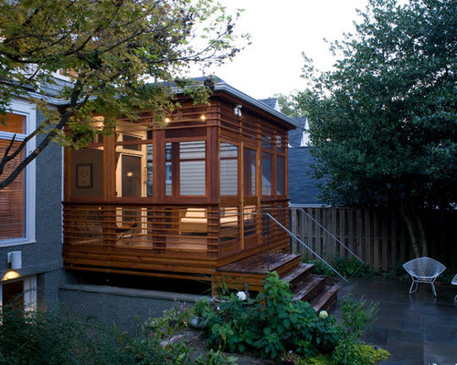Modern Porch Christchurch Minimalist screened-in porch photo in DC Metro with decking and a roof extension