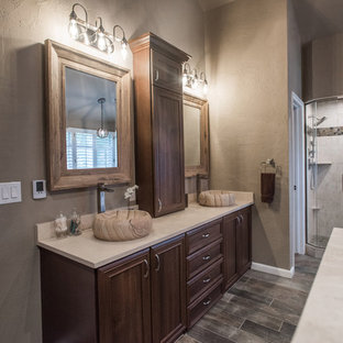 Example of a large classic plywood floor and brown floor bathroom design in Denver with raised-panel cabinets and medium tone wood cabinets