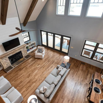 Architectural Designs Exclusive Show-Stopping Vacation Home Plan 18302BE