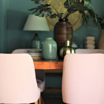 Millennial Pink Blush Dining Chairs at Wooden Table