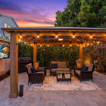 Covered Patio Lounge with Integrated Lighting and Outdoor Living Design