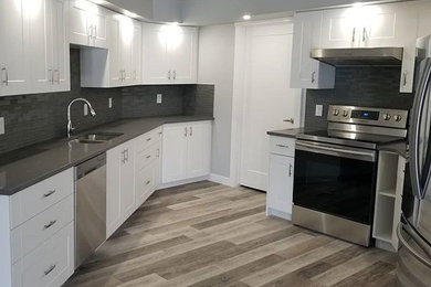 Kitchen - contemporary kitchen idea in Calgary