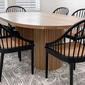 'Aura' Fluted Oval Dining Table with Half Moon Bases