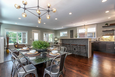Example of a large cottage chic dark wood floor great room design in Denver with gray walls, a standard fireplace and a tile fireplace