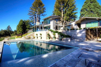 Inspiration for a contemporary pool remodel in Other