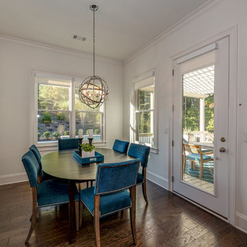 Breakfast Room with deck access overlooks back yard oasis. (Rug pending)