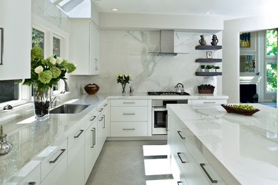 Contemporary Kitchen countertops, island, and backsplash, in Slim Slab Calacata