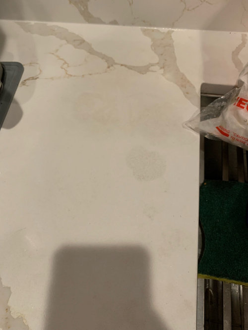how to remove these stains from quartz countertops