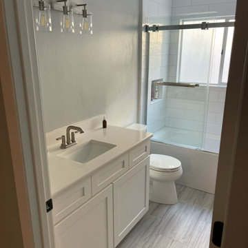 Modern Kitchen and Bath Remodel Done in Polar White
