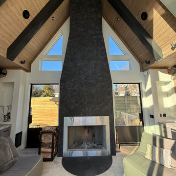 Glossy Black Venetian Plaster Fireplace