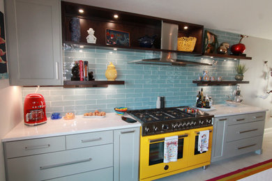 Example of an eclectic kitchen design in Other