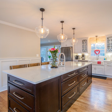 A view from the beverage bar through to the kitchen and small seating area by th