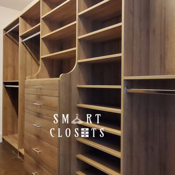 Master Walk In and Wall Unit Closet in Esterel Finish Designed by Smart Closets
