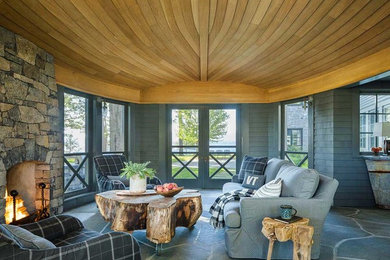 This is an example of a farmhouse porch design in Burlington.
