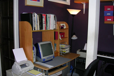 Inspiration for a small contemporary freestanding desk home studio remodel in Chicago