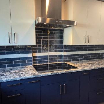 Blue and White Kitchen with Tiled Pass Through