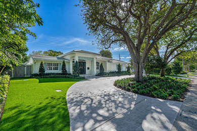 Beach style home design photo in Miami