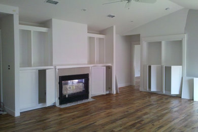 Trendy kitchen photo in Austin with white cabinets