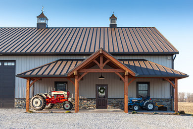 Example of a farmhouse garage design in Other