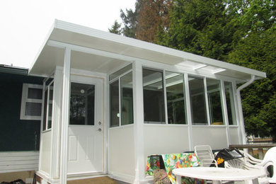 Example of a mid-sized sunroom design in Vancouver