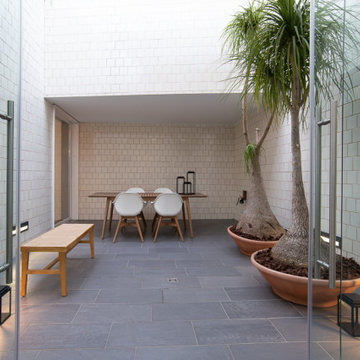 Patio with Palms and Small Dining Table, Aroeira