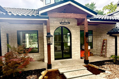 Transitional exterior home idea in Austin