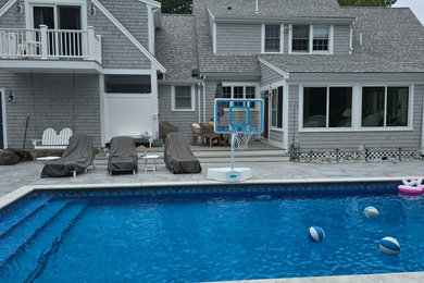 Example of a beach style pool design in Boston