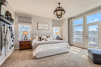 Photo of a traditional master bedroom in Denver.