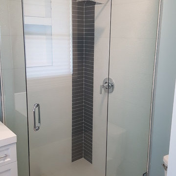 Los Altos Mirrors, Shower Enclosure, cabinet door glass installed-Art Ruiz build