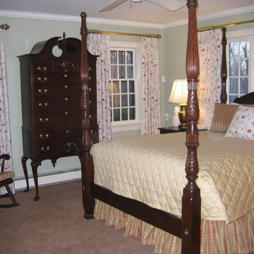 Pleated Draperies on Decorative Metal Rods, Quilted Coverlet, Gathered Bed Skirt