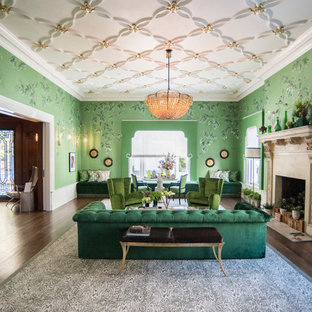 Eclectic formal and enclosed dark wood floor living room photo in San Francisco with green walls, a standard fireplace and a stone fireplace
