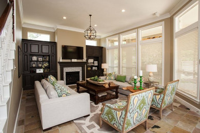 Living room - large formal and open concept ceramic tile living room idea in Houston with beige walls, a standard fireplace, a tile fireplace and a wall-mounted tv