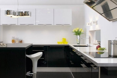 Design ideas for a mid-sized modern l-shaped kitchen in Aarhus with flat-panel cabinets and with island.