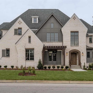 Elegant 5-Bedroom Tudor House Plan with Open Layout - San Antonio, TX