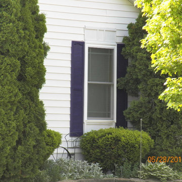 Pella 250 Series White Windows With Purple Shutters Chesterfield Michigan